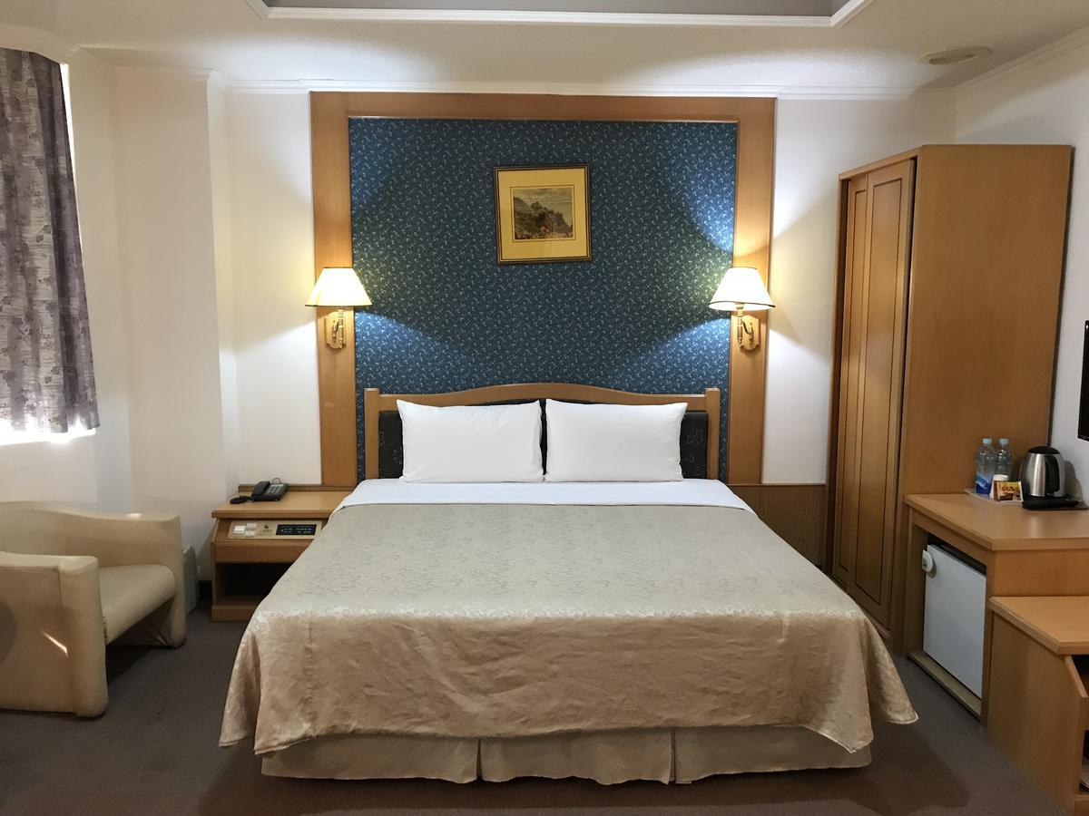Shiah Yih Hotel Huwei Buitenkant foto