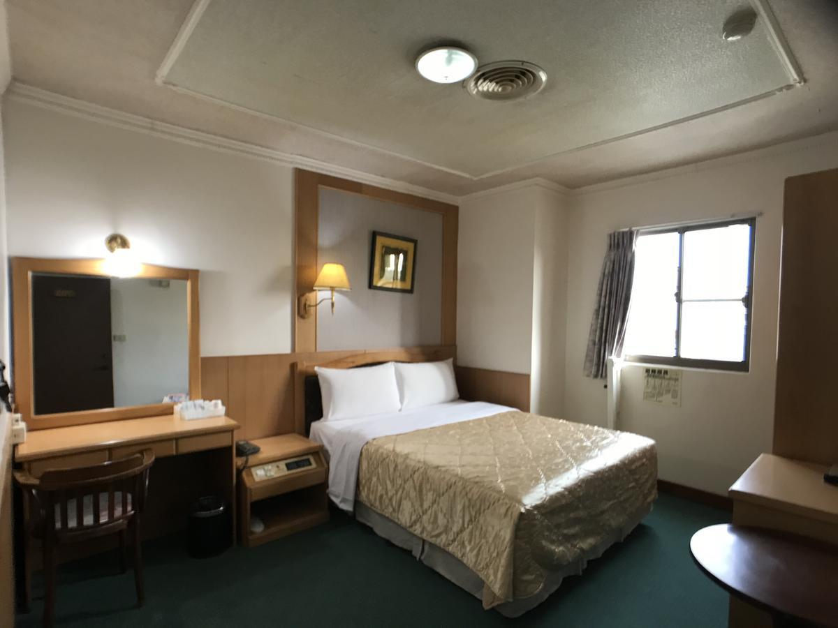 Shiah Yih Hotel Huwei Buitenkant foto